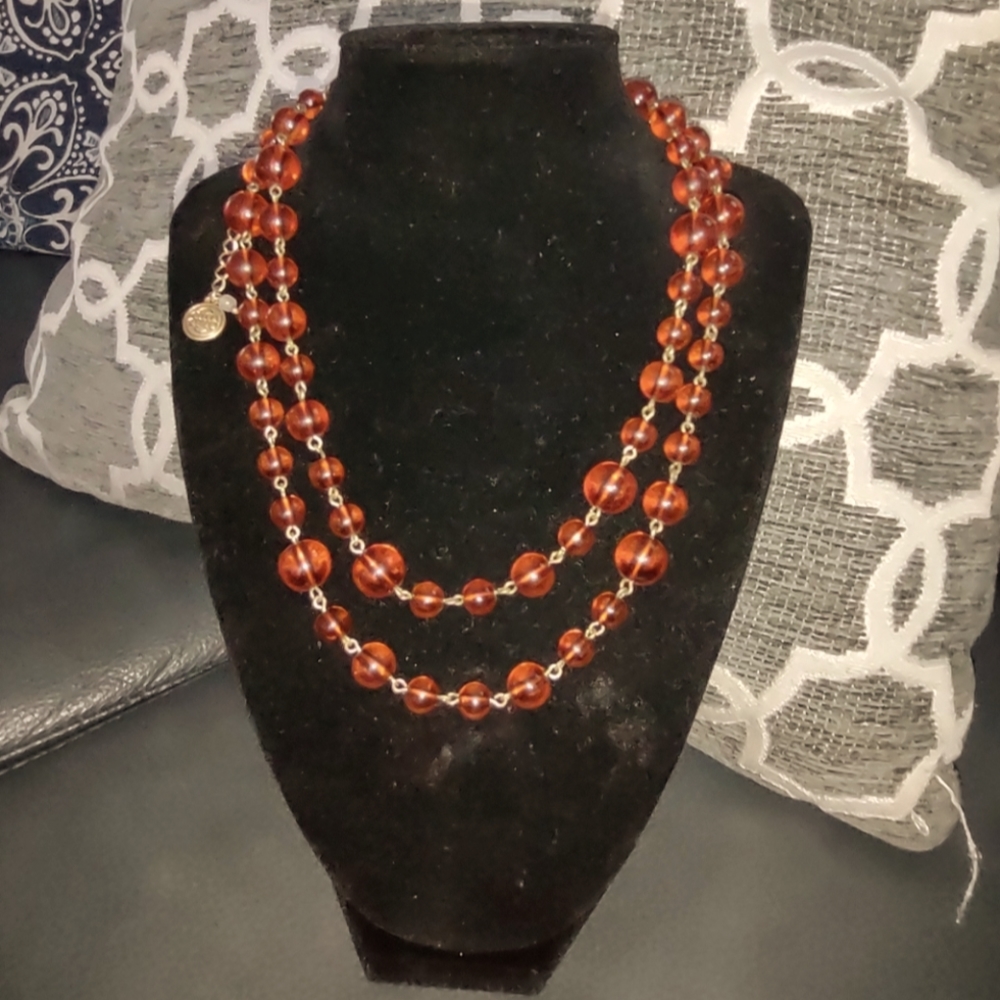 Baskin brothers amber toned beaded necklace.  38 inches long.
